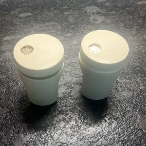 Vintage Tupperware salt and pepper shakers Gray and white markings. Ligh…